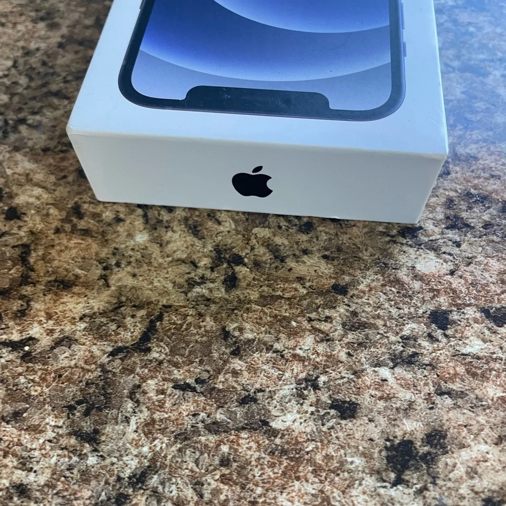 Sleek Smartphone‎ with Black empty box